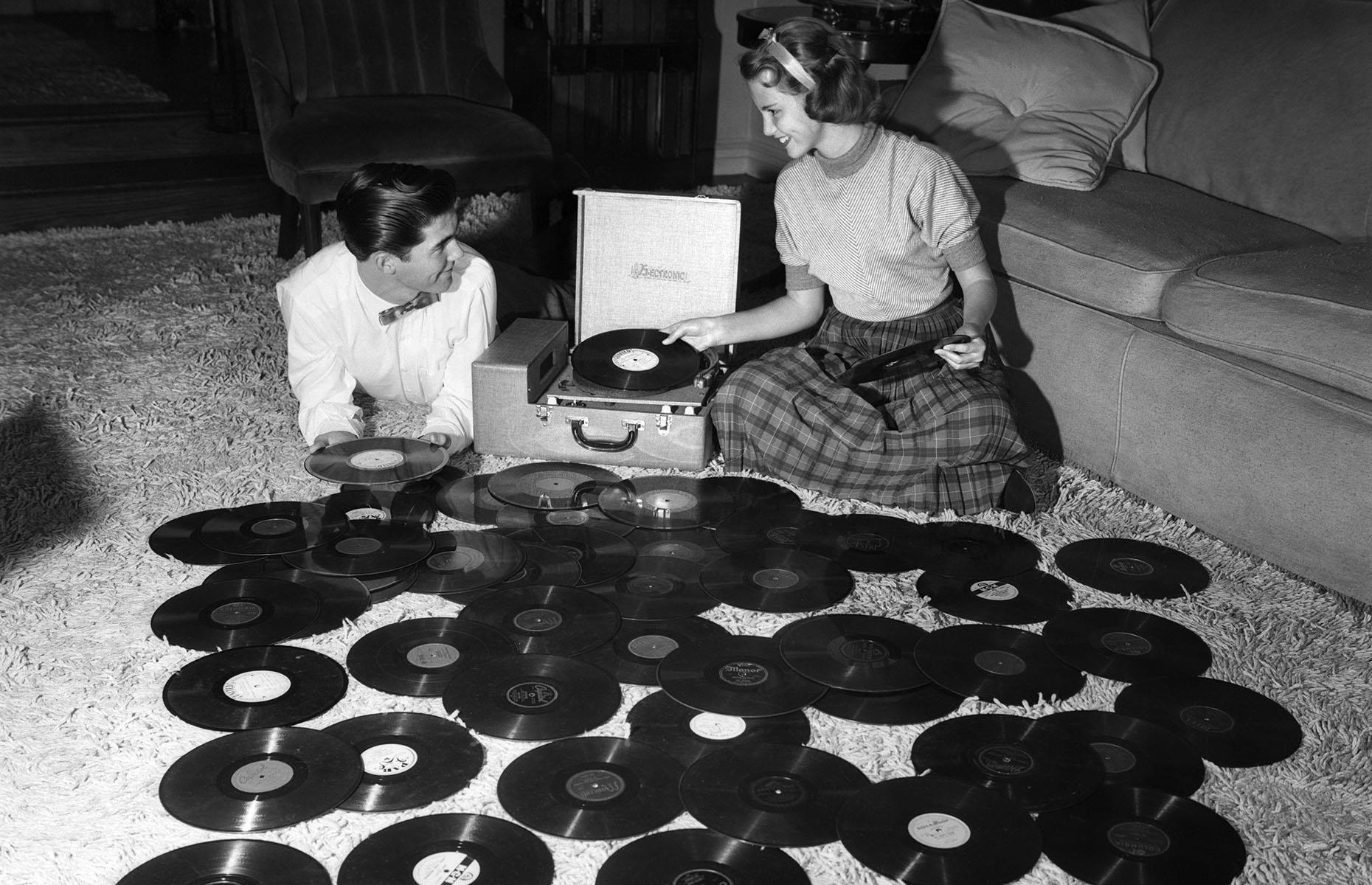 Teenagers listening to records, 1950s